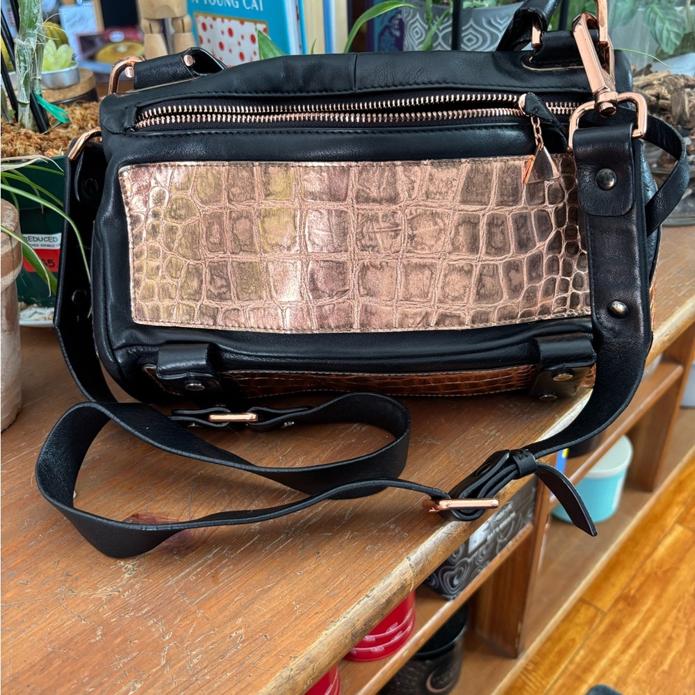 Elegant Black and Rose Gold Leather Crossbody Bag